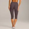 leggings capri marroni