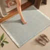 Patrón de cuadros con borlas - gris y blanco