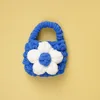 White flowers-blue bag