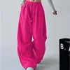 Pantaloni dritti color rosso rosa con cordoncino