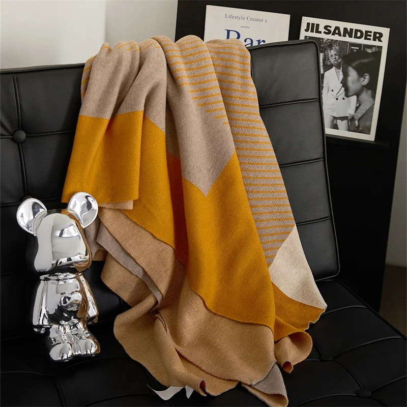 Stay warm and stylish with a supersized wool throw