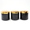 black jar with gold lid