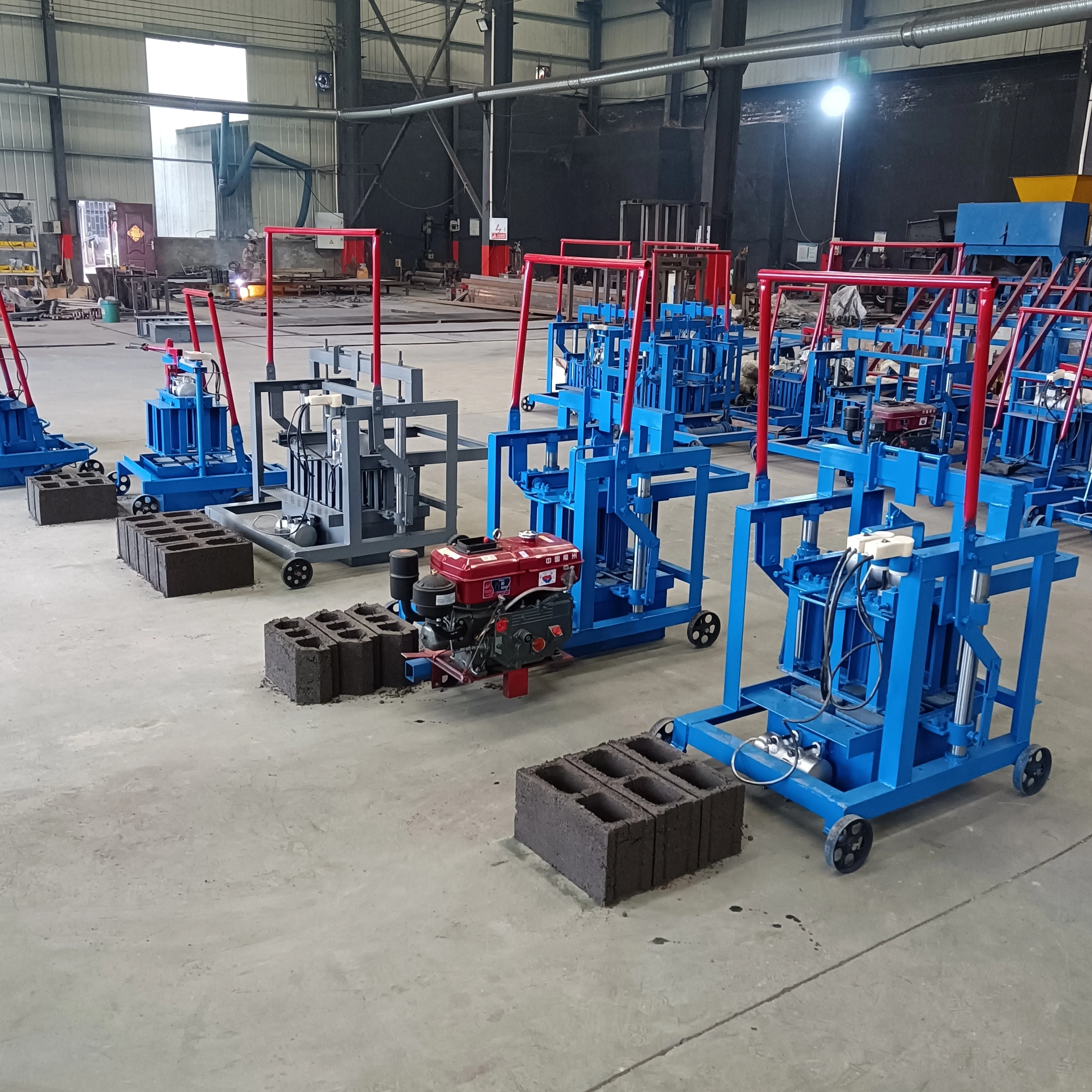 Egg Laying Mobile Manual Brick Machine Concrete Cement Brick Making Machine Small Hollow Block Making Machine for Sale in USA