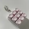 9 teclas rosa claro