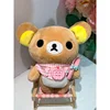 Bavaglino e cucchiaio rosa Rilakkuma
