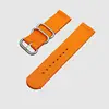 Pulsante arancione-argento