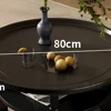 Tavolino da caffè grande, nero e con struttura rinforzata.
