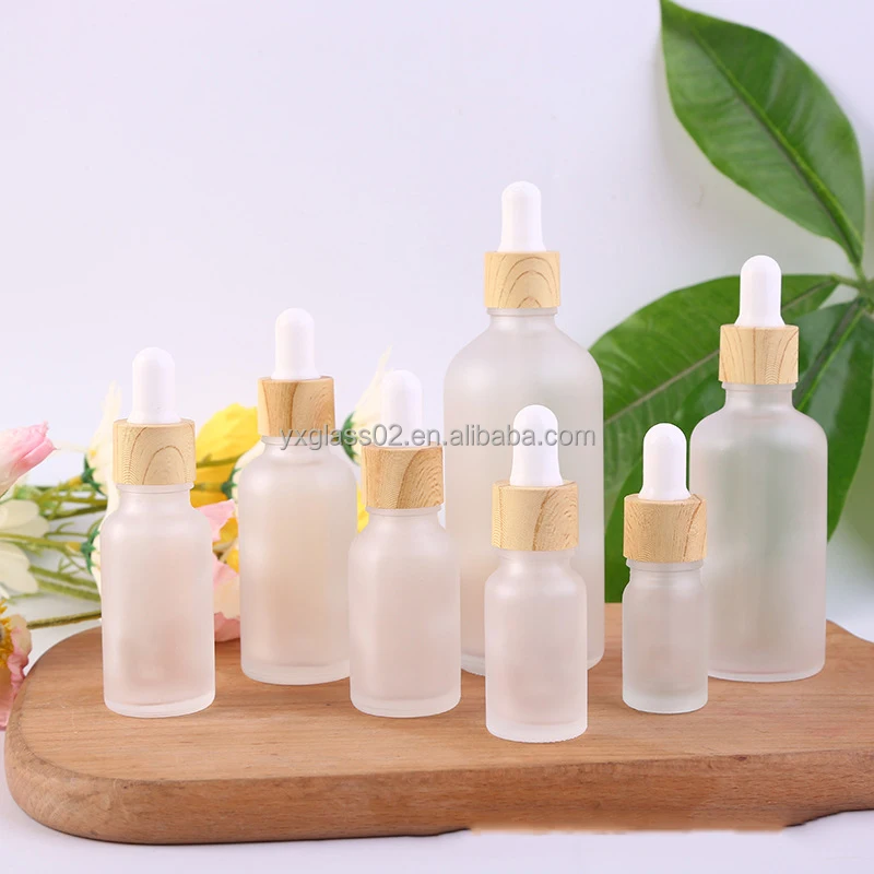 Frosted Essential Oil glass bottle serum glass bottle Flat Shoulder Dropper bottle with Plastic environmentally wood grain ring factory