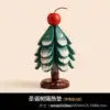 Four-tiered Christmas tree with apples