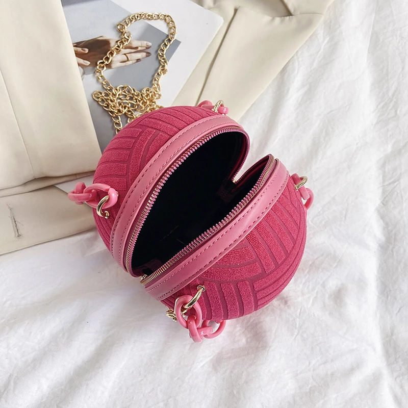 Trendy Women's Handbags with Round Shaped Chain Design