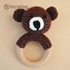 Campana de mano de oso pardo