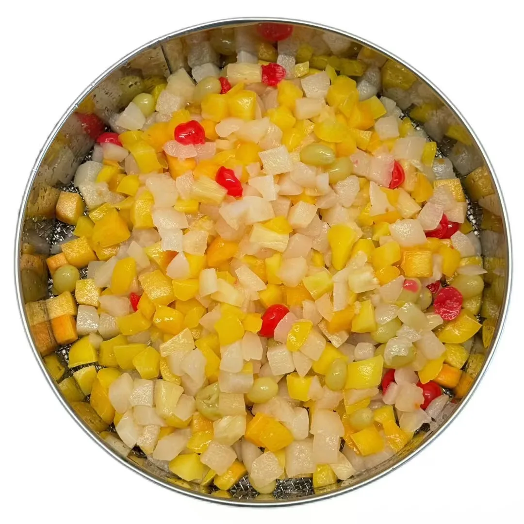 Fresh and High-quality Fruit Cocktail Jar Is Crafted From Tropical Fruits and Features Canned Fruits Soaked in Syrup.