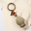 1685 Pea Fruit include accessori per appendere