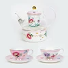 Flower tea set + set of two small cups and saucers