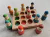 peg dolls in sorting tray