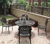 4 chaises diagonales table de cuisson carbone 122cm