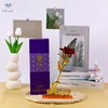 RED rose with purple box