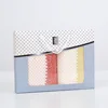 Towel gift box containing two towels (red and yellow)