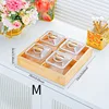 4-compartment transparent PET striped dish with gold and wood base