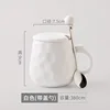 White spoon with lid