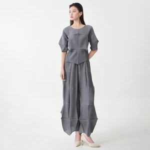 Factory Wholesale Women's Fashion Set Design Top and Pants Two-piece Set Pleated Stretch Casual Solid Color Set