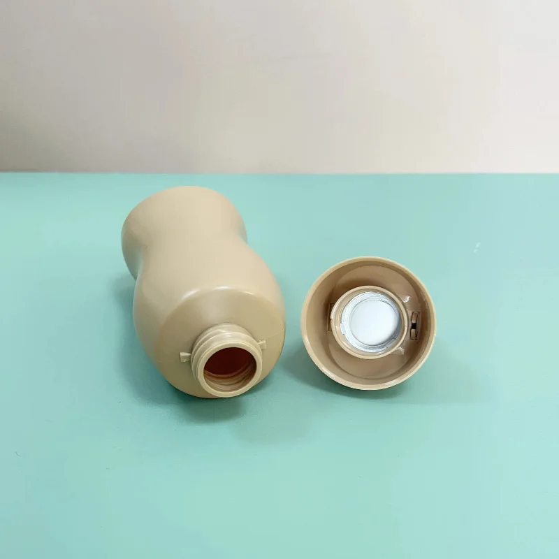 Factory Direct Sales of a Variety of Capacity 170ml 180ml 240ml 300ml Hdpe Hair Essential Oil Comb Bottle