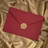 Red with wax seal sticker