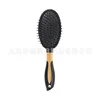 Black oval [with gold central ring cushion comb]