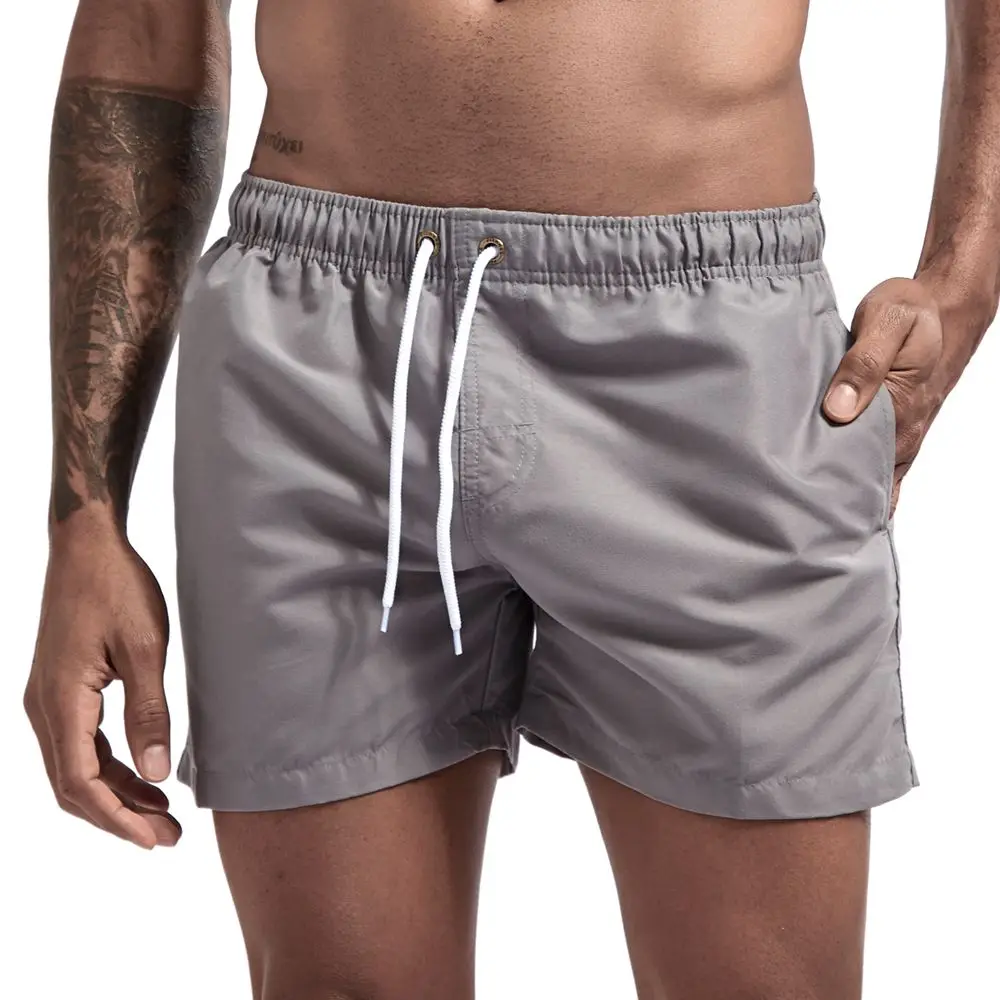 JOCKMAIL high quality sexy men's short sports casual solid color shorts swimming beach surfing gym shorts for men268_voghion.com