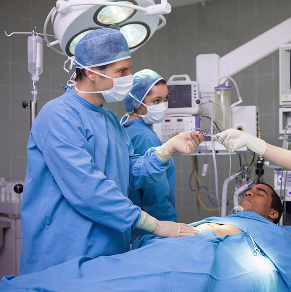 最优惠的价格一次性隔离衣,背部绑带防静电蓝色无纺布短信外科手术衣