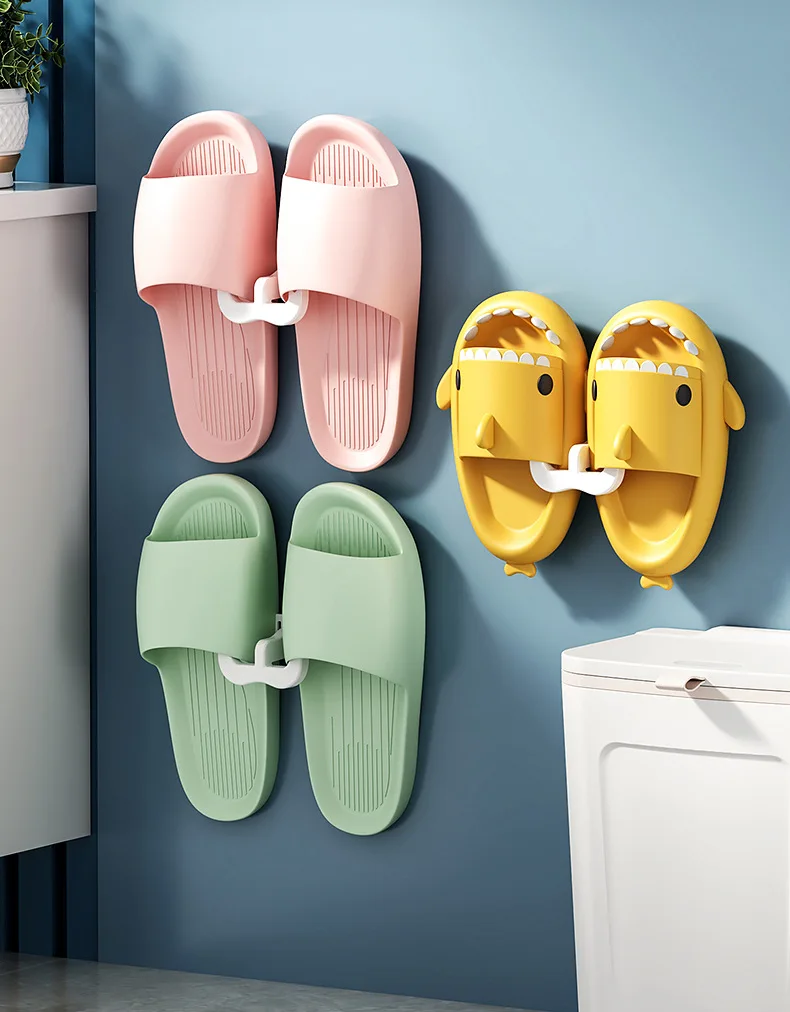 Bathroom slipper rack Wall-mounted perforation-free toilet shoe drain rack Bathroom wall storage sandal rack supplier