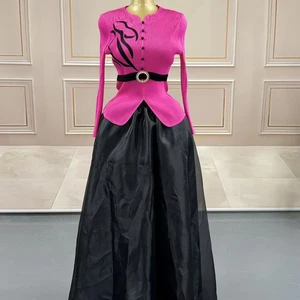 Elegant Pleated Two - Piece Set: Fuchsia Top with Black Pattern  Black Organza Maxi Skirt