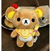 Bavaglino e cucchiaio gialli Rilakkuma