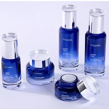 Luxury 30 40 50ml blue cosmetic glass bottle sets toner bottle 120ml acrylic cap glass jar for skincare face cream lotion bottle