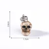 11 silver crown skulls