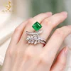 Bague torsadée de laboratoire avec feuille d'émeraude et diamant