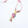 Collier poisson vert coloré