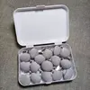 Caja de almacenamiento gris de 16 unidades con clavos de tela y alfileres de acero.