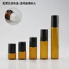 Amber bottle + glass roller ball + plastic black cap