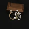 GO0412-35 Spilla pavone