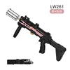 Silver spray gun with black and pink straps