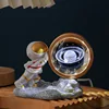 Striving astronaut-saturn