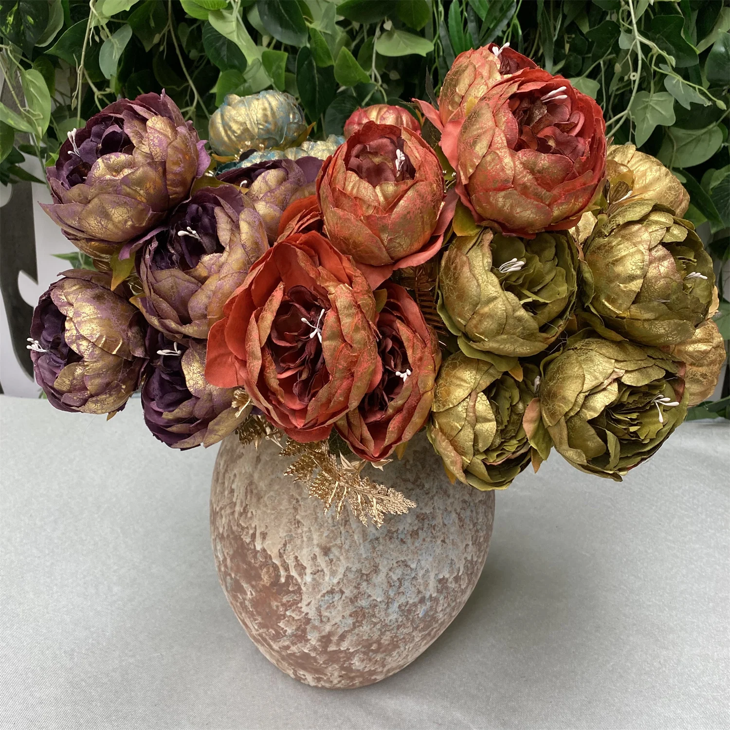 Elevate your outdoor decor with a vibrant artificial flower wall