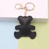 Hebilla de cadena dorada-oso-negro