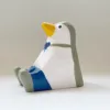 Supporto per cellulare a forma di pinguino colorato