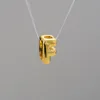 Oro-F (ciondolo singolo senza collana)