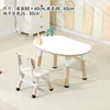 A white wooden table and chair