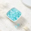 Perles de verre bicolores - bleu clair et blanc