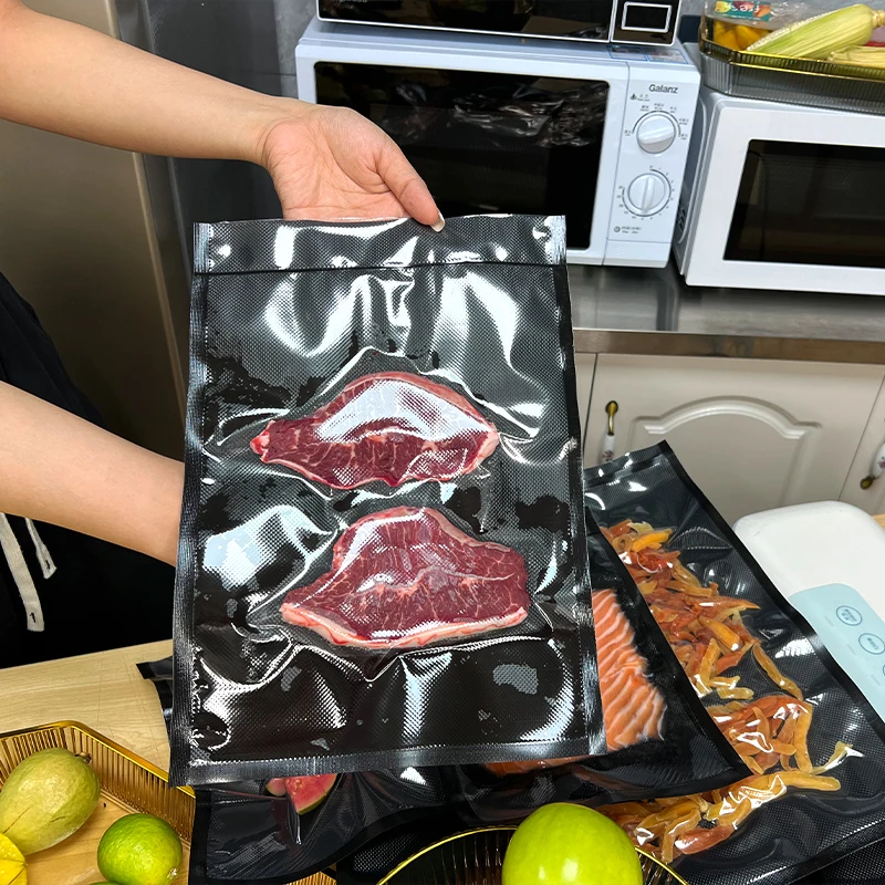 China Supplier Custom Textured Embossed Black Transparent Food Saver