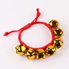 Croix cloche corde rouge or
